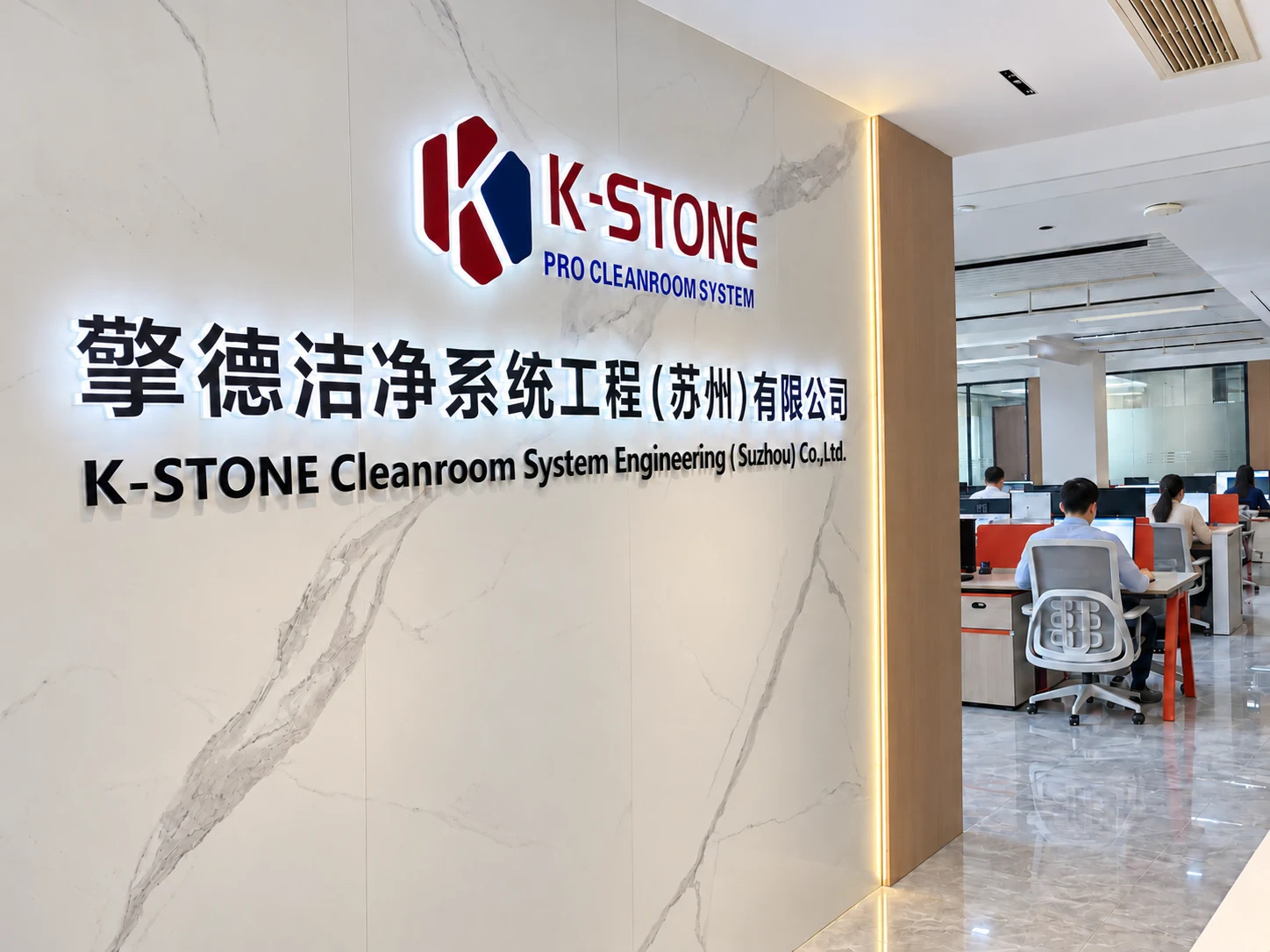 K-STONE office entrance and team working beyond